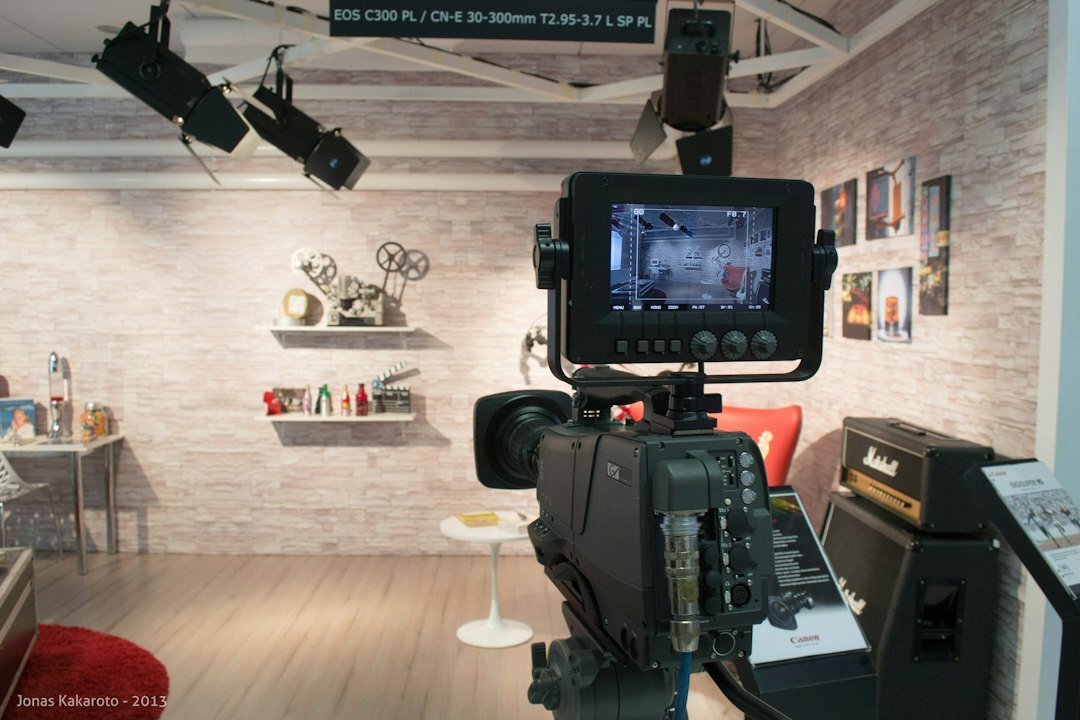 Television control room with multiple monitors showing broadcast feeds